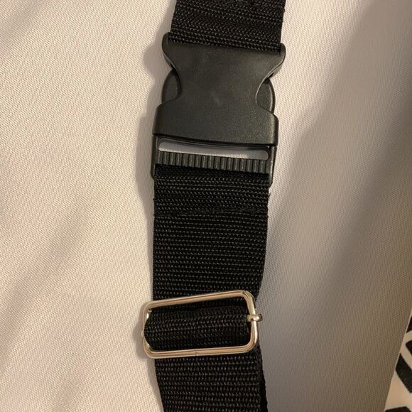 Initials Sling Backpack NWOT black & white with adjustable wide strap - Picture 6 of 9